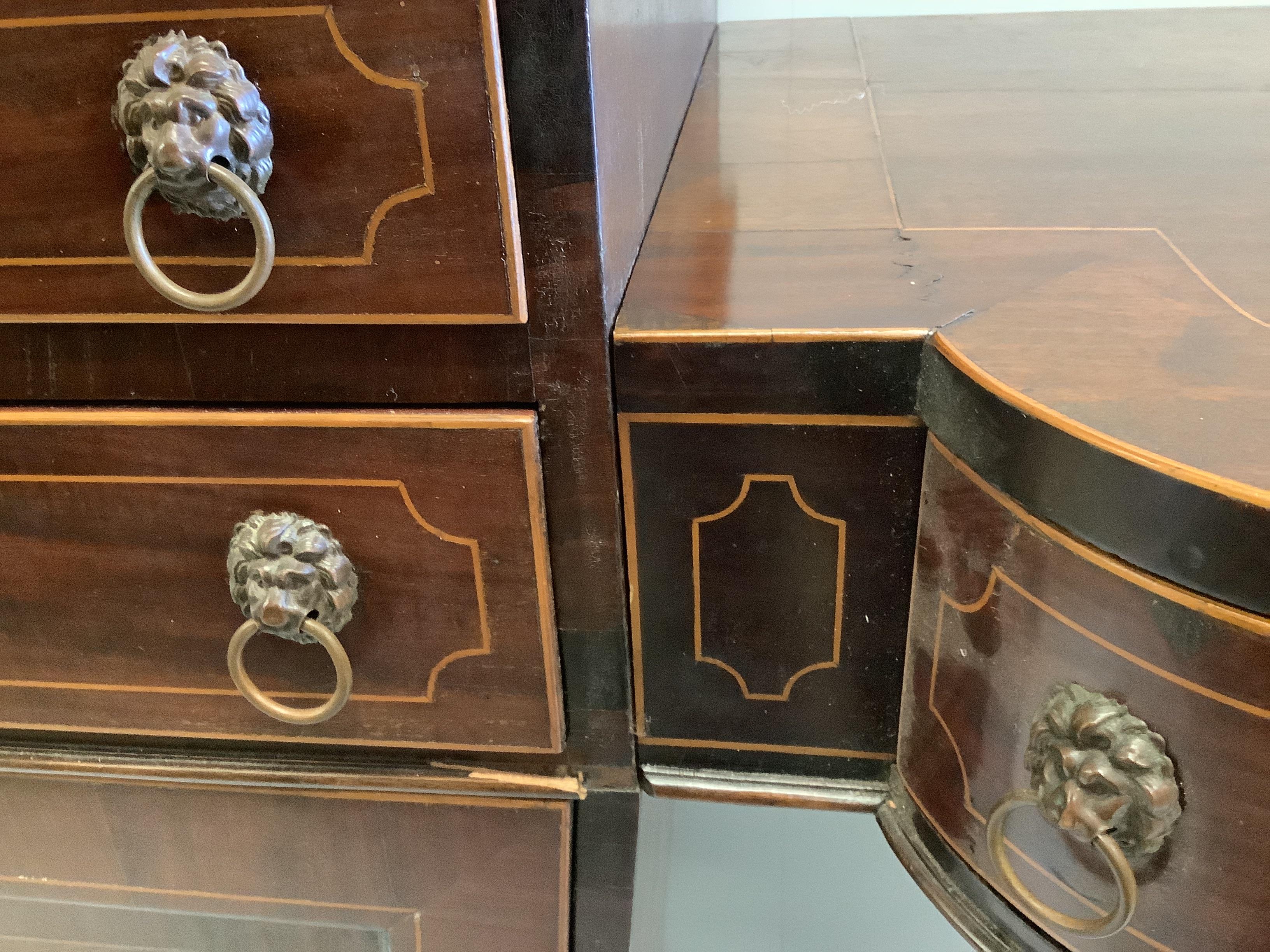 A George IV inlaid mahogany pedestal sideboard, length 203cm, depth 46cm, height 110cm